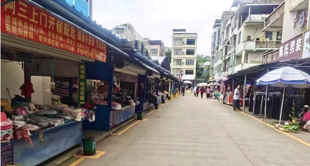 西乡塘区金陵镇农贸市场旧貌换新颜村民拎出满满幸福感