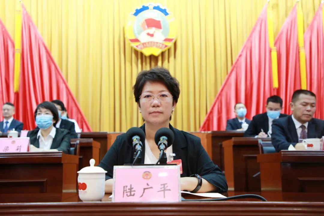 城区党委书记陆广平,城区政府区长李冉,城区政协主席覃良川,城区党委